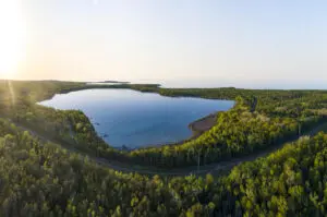 Aerial panorama of the quiet forested bay